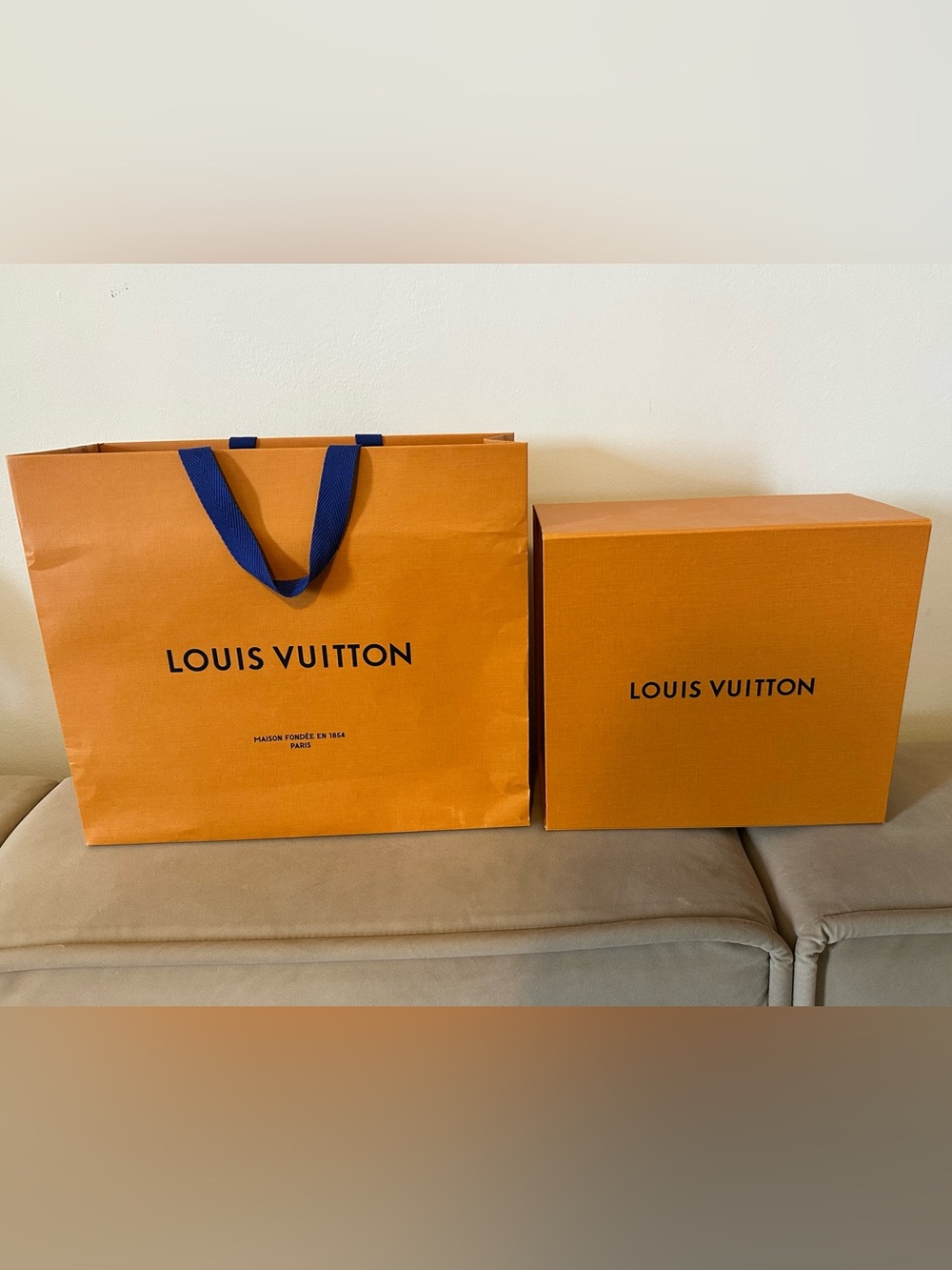 Authentic Louis Vuitton storage box & shopping bag